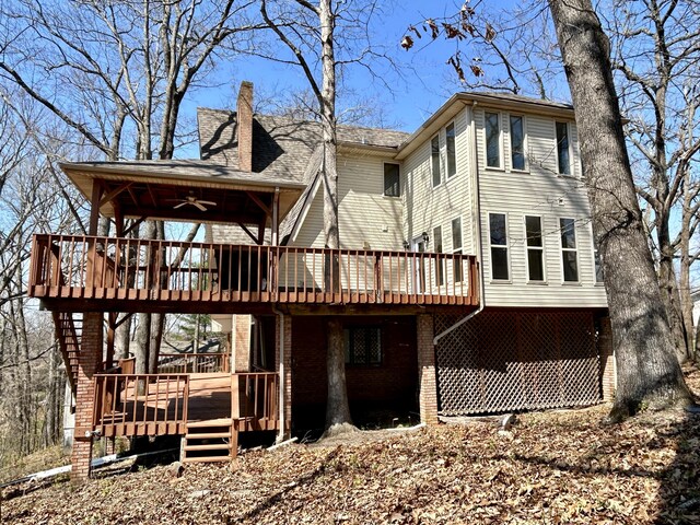 3101 Simpson Dr, Somerset, KY 42503 - rear view of house featuring a chimney, a wooden deck, and brick siding