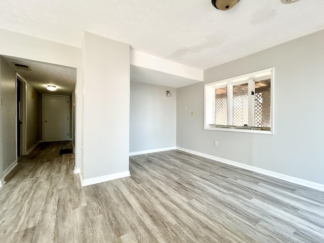 3101 Simpson Dr, Somerset, KY 42503 - spare room with visible vents, baseboards, and wood finished floors