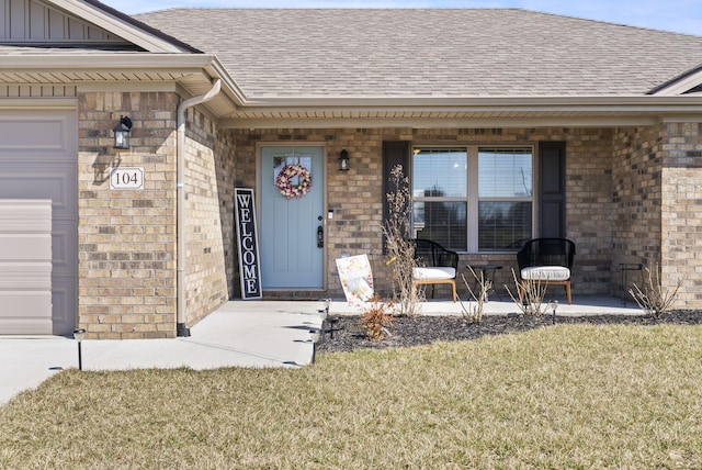 property entrance with brick siding, board and batten siding, and a porch