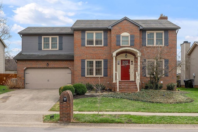 view of front of house featuring an attached garage, brick siding, driveway, and a chimney