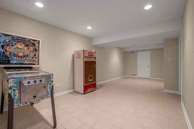 rec room with recessed lighting and baseboards