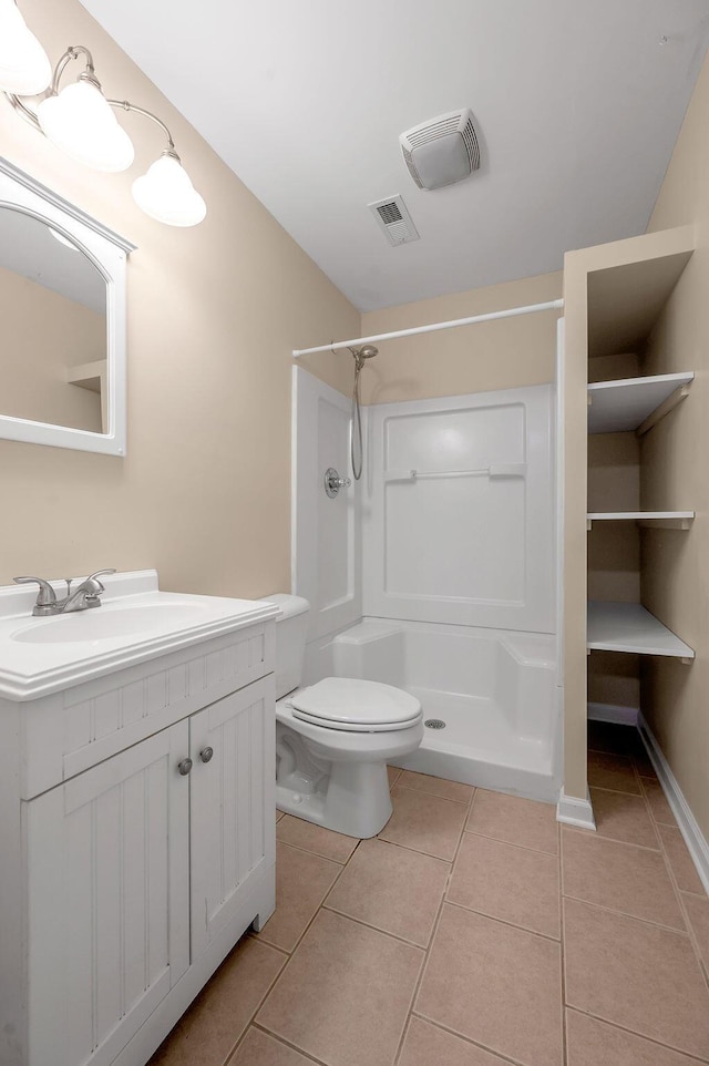 full bath with tile patterned flooring, toilet, visible vents, and walk in shower