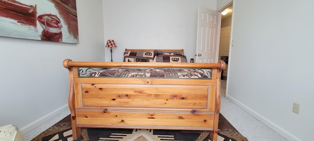 bedroom featuring baseboards