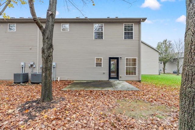 back of property with a patio area