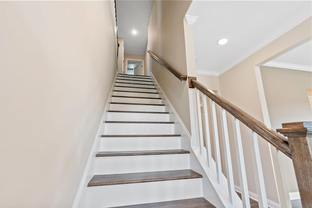 staircase featuring recessed lighting and crown molding