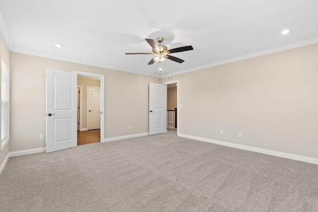 unfurnished bedroom with baseboards and ornamental molding