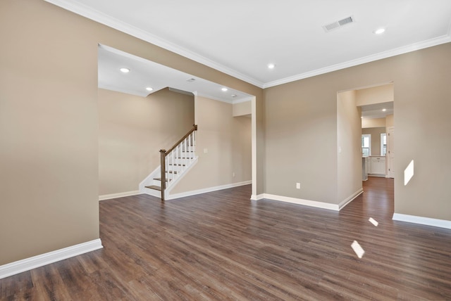 interior space featuring visible vents, baseboards, stairs, dark wood-type flooring, and crown molding