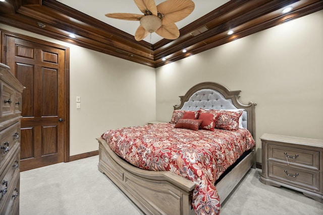 bedroom with baseboards, light carpet, ornamental molding, and a ceiling fan