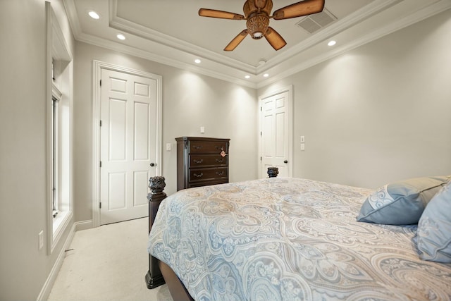 bedroom featuring visible vents, crown molding, carpet floors, recessed lighting, and a raised ceiling