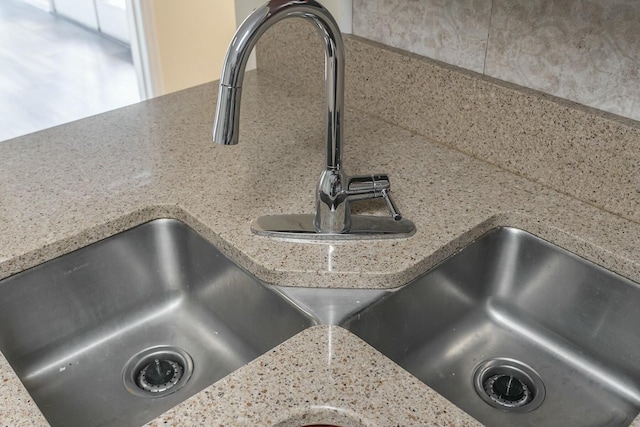 interior details featuring a sink
