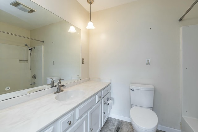 bathroom with washtub / shower combination, visible vents, toilet, and vanity