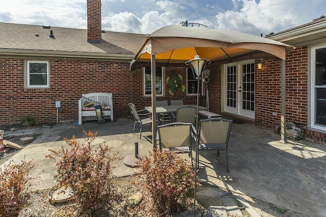 view of patio / terrace featuring outdoor dining space and french doors