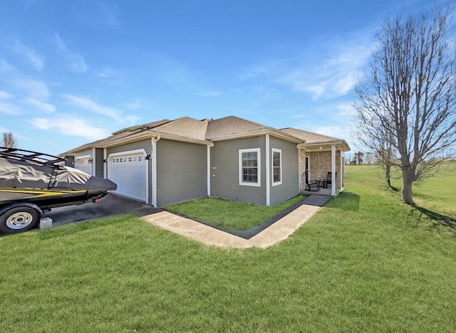 view of property exterior featuring a yard, a garage, and driveway