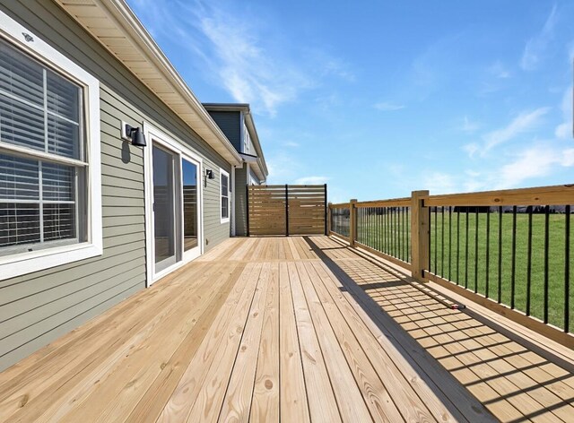 deck featuring a lawn
