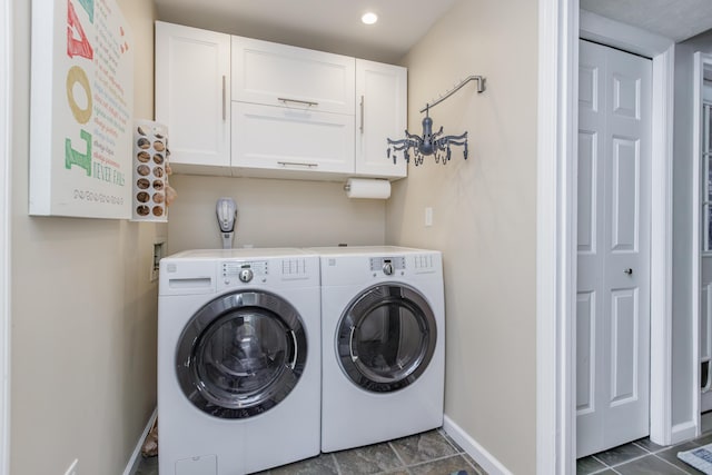 laundry room with recessed lighting, cabinet space, washer and dryer, and baseboards