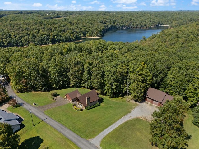 bird's eye view featuring a view of trees and a water view