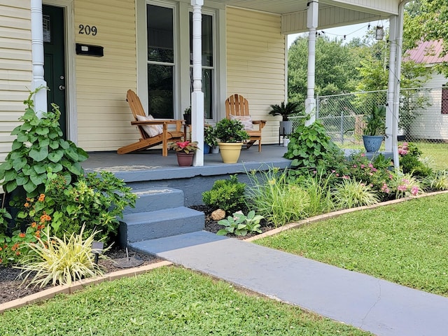 doorway to property featuring covered porch