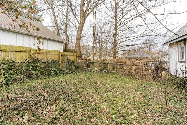 view of yard with fence