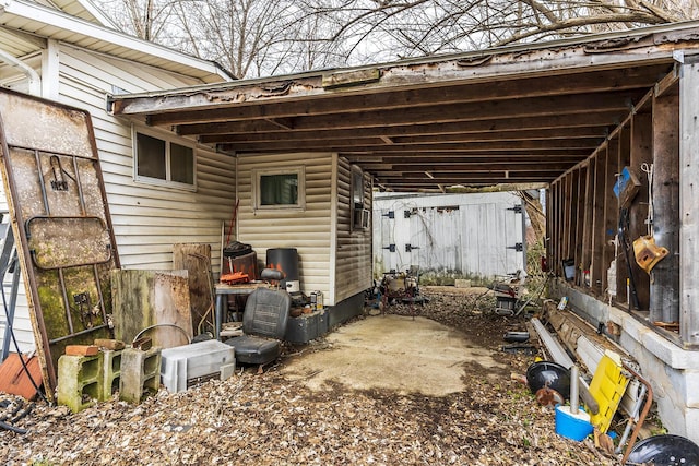 view of patio / terrace with a carport