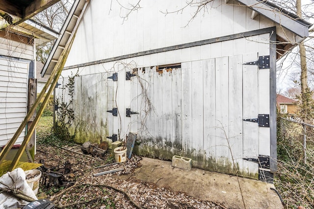 view of side of property with fence