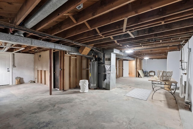 unfinished basement with heating unit and water heater