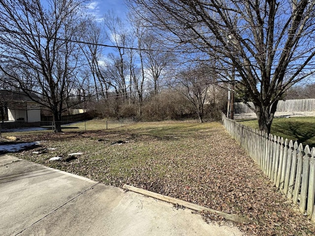 view of yard featuring fence