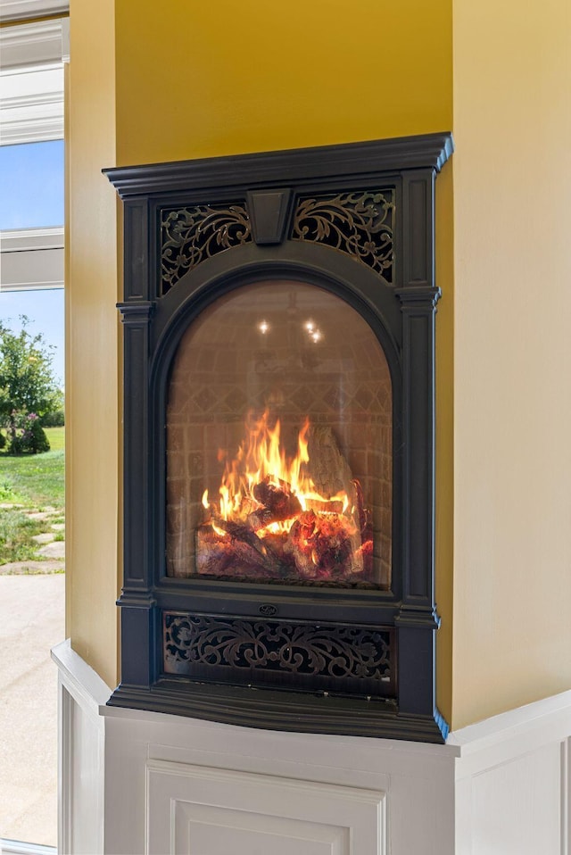 room details with a warm lit fireplace