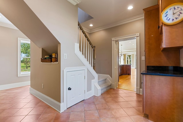 stairs with tile patterned flooring, recessed lighting, and ornamental molding