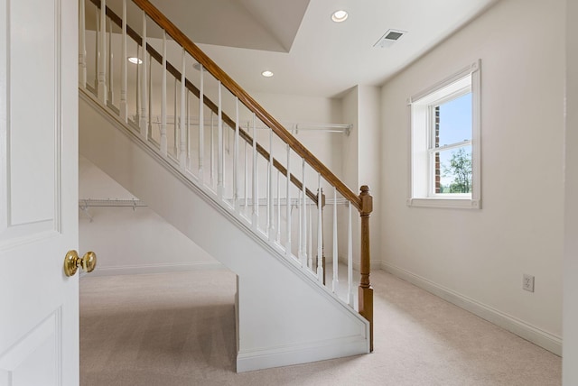 stairs featuring carpet flooring, recessed lighting, baseboards, and visible vents