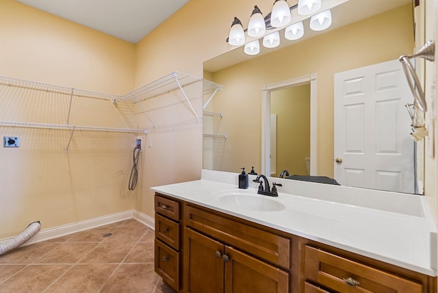 bathroom with tile patterned floors, toilet, and vanity