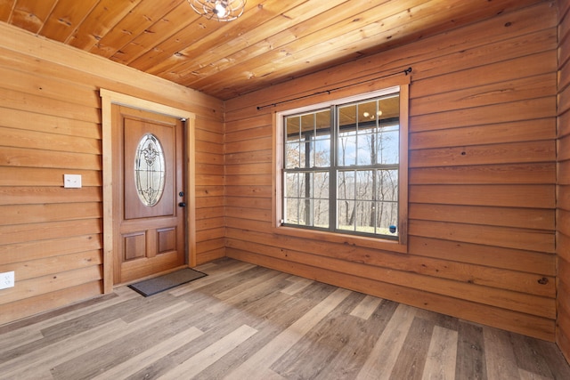 entryway with wooden ceiling and wood finished floors