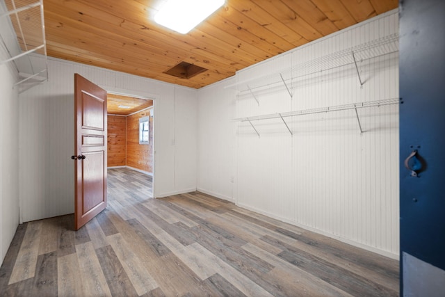 walk in closet featuring wood finished floors