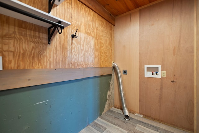 clothes washing area featuring hookup for a washing machine, wood finished floors, hookup for an electric dryer, laundry area, and wooden ceiling