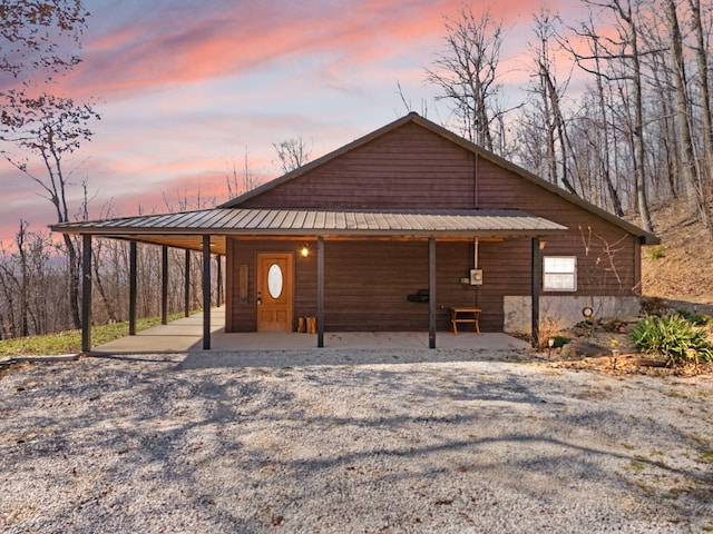 view of front facade with metal roof