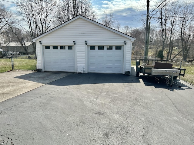 detached garage with fence