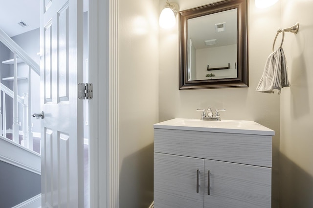 bathroom featuring visible vents and vanity