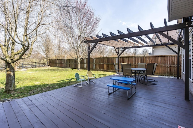 deck featuring outdoor dining area, a yard, fence, and a pergola