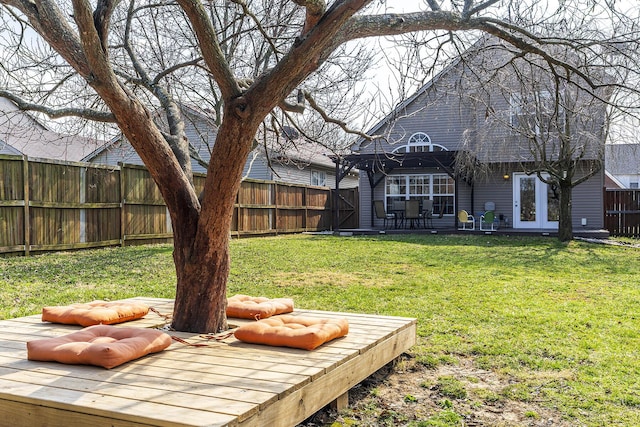 view of yard with a fenced backyard