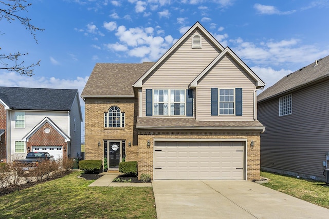 traditional-style home with brick siding, a front lawn, roof with shingles, a garage, and driveway