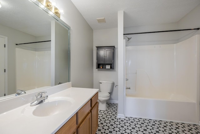 full bathroom with vanity, visible vents, a textured ceiling, tile patterned floors, and toilet