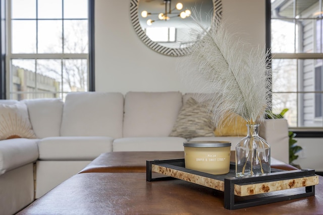 living room featuring an inviting chandelier