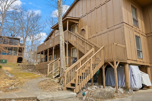 view of property featuring stairs