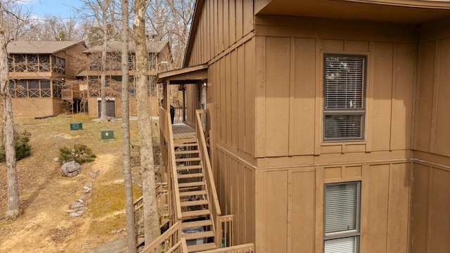 view of property exterior with board and batten siding