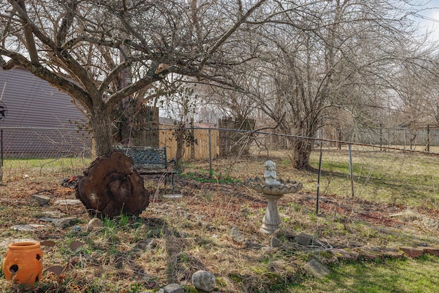 view of yard with fence