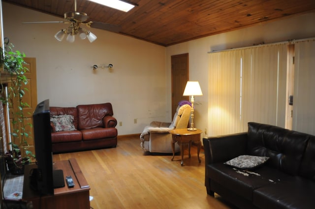 living area with vaulted ceiling, wooden ceiling, ceiling fan, and wood finished floors