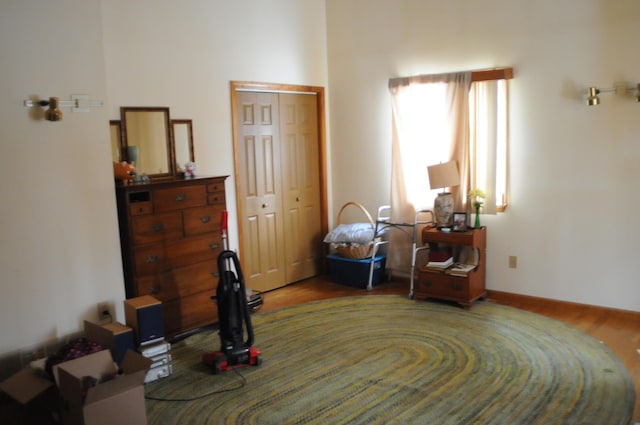 bedroom featuring a closet and wood finished floors