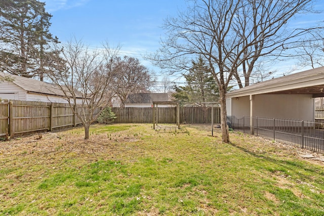 view of yard with a fenced backyard