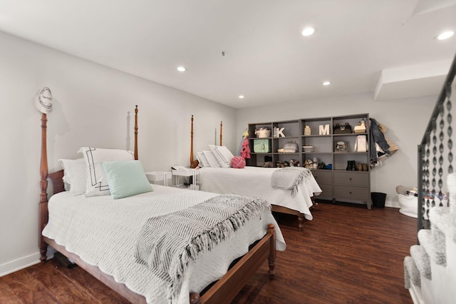 bedroom featuring recessed lighting, baseboards, and wood finished floors