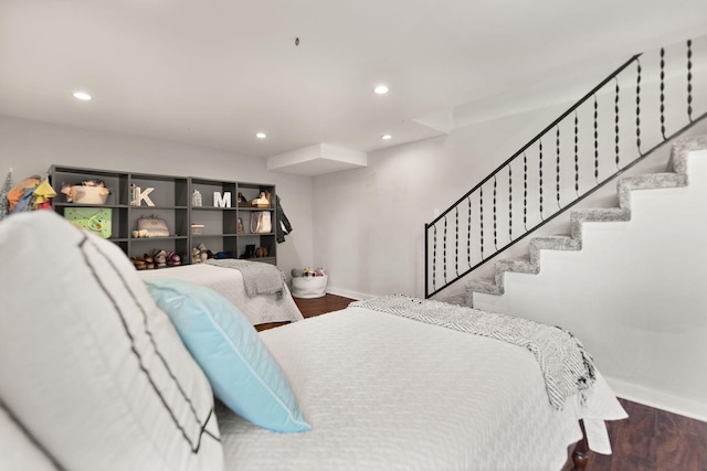 bedroom featuring recessed lighting, baseboards, and wood finished floors