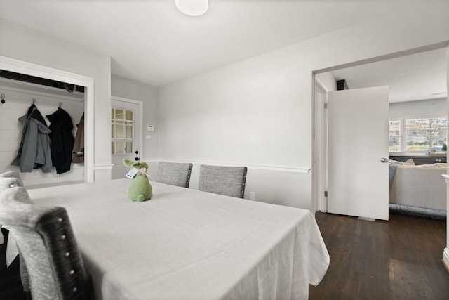 dining room with dark wood-style flooring